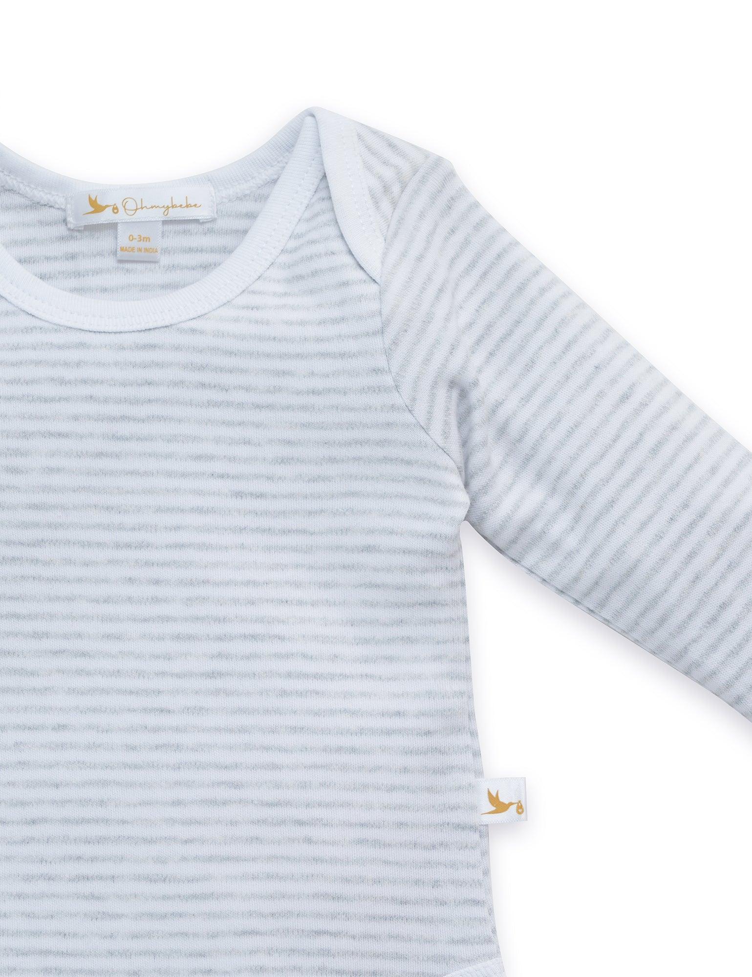 Close-up of grey and white striped organic cotton long sleeve baby onesie, 0-3 months size