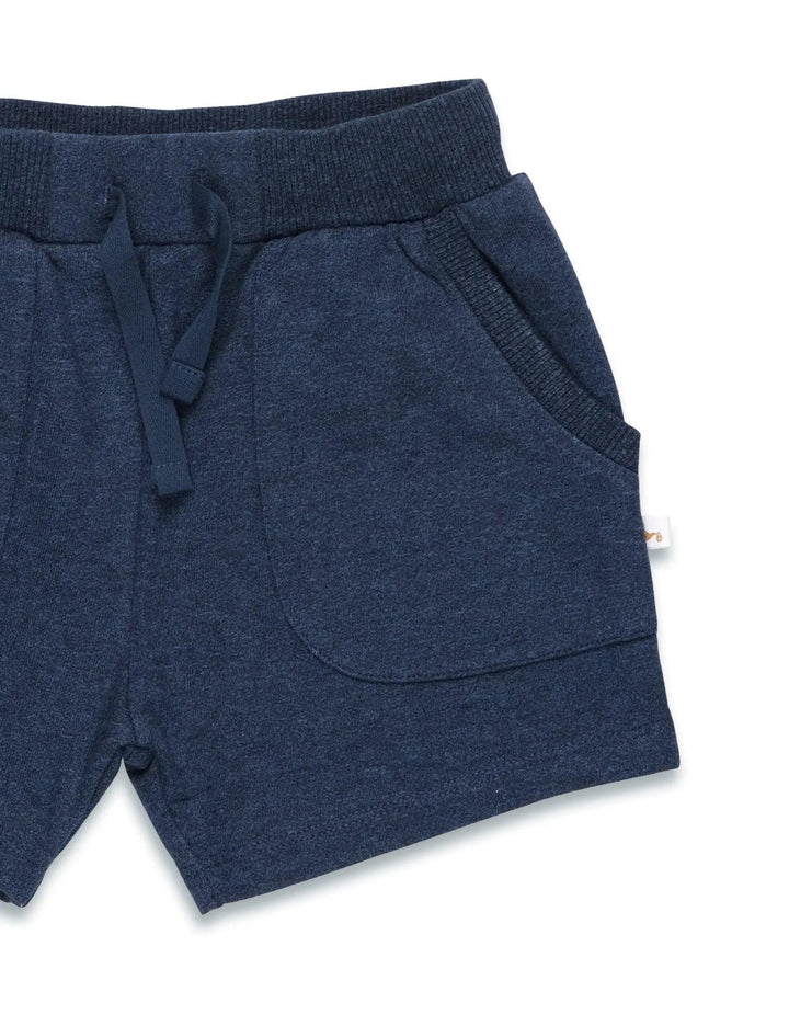 Close-up of the navy blue organic cotton baby shorts showing the elasticated waistband and drawstring detail. Shop comfortable baby bottoms India.