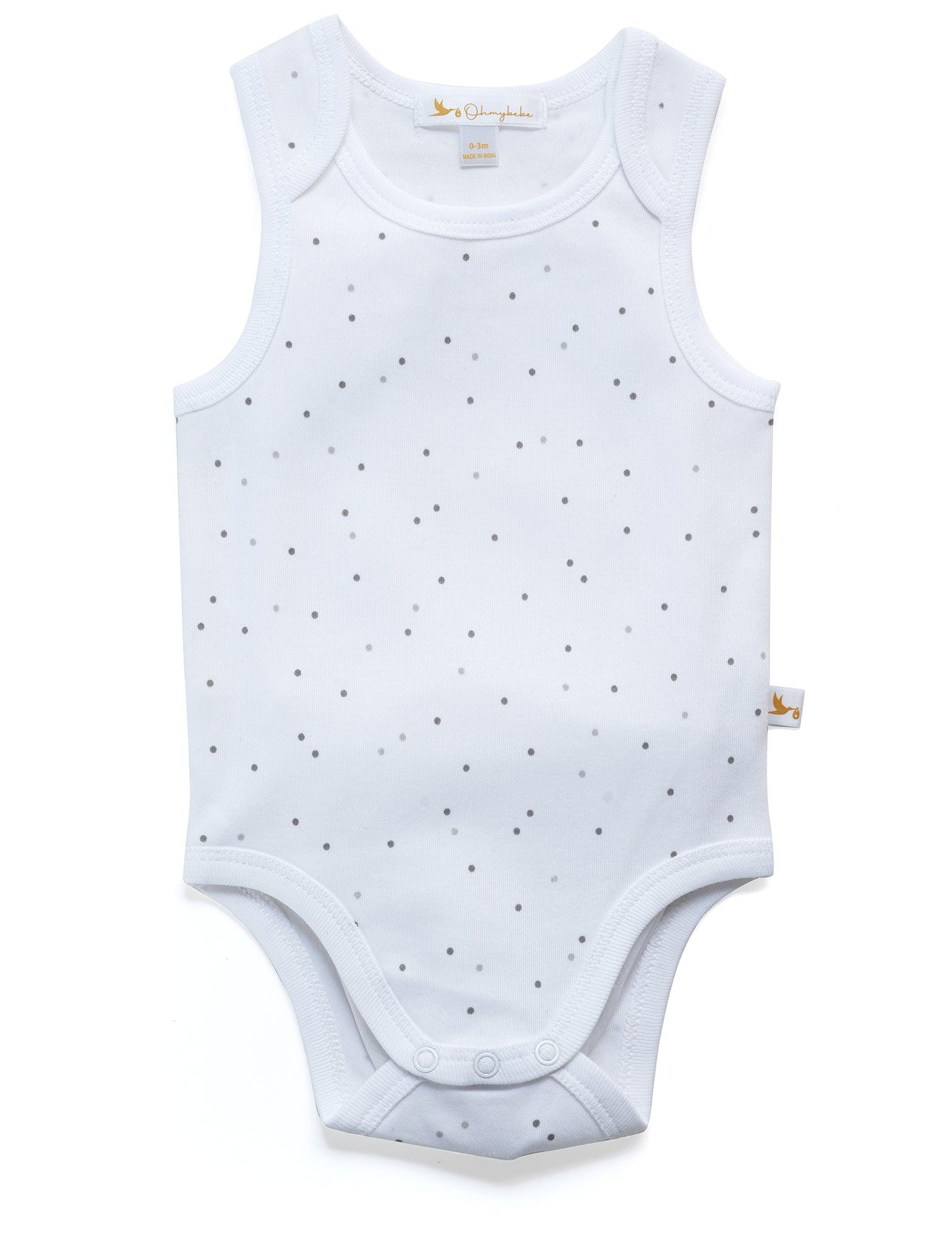 White sleeveless organic cotton baby bodysuit with small grey polka dots and snap closures