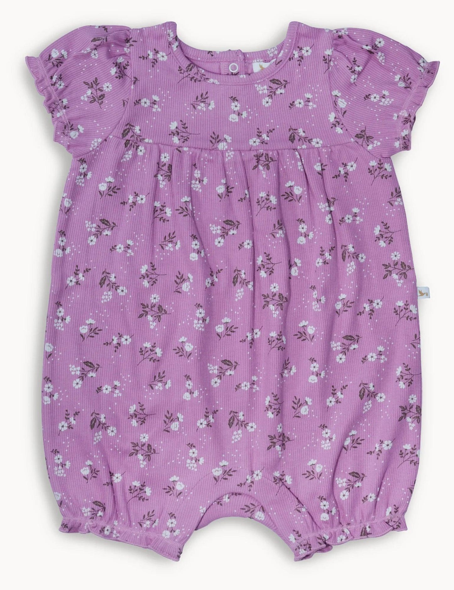 Purple baby romper with organic white daisy print and ruffled sleeves and leg cuffs