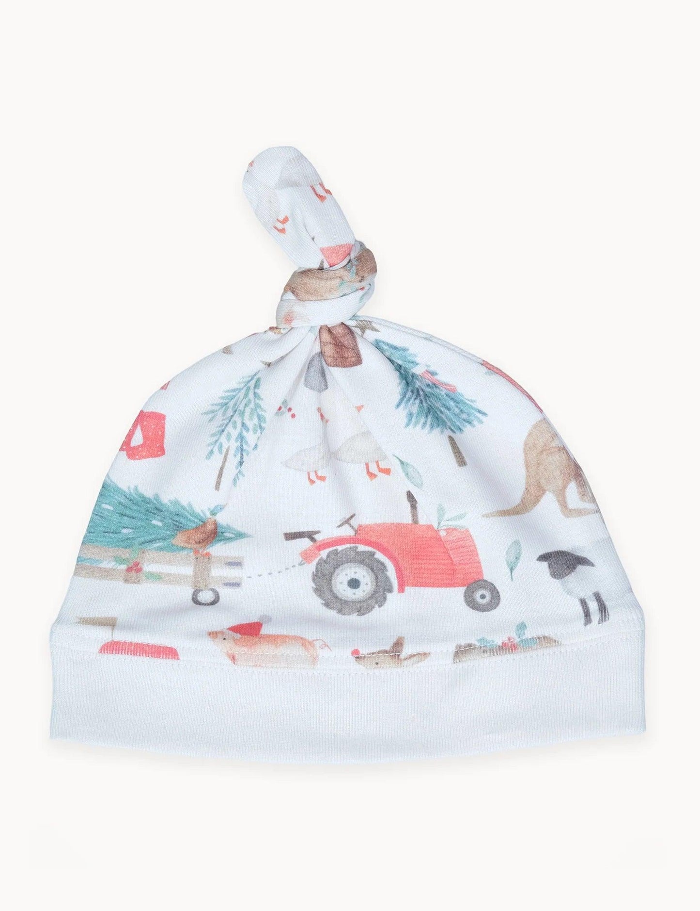 Organic baby knot hat with farm-themed print including tractor, animals, trees on white fabric