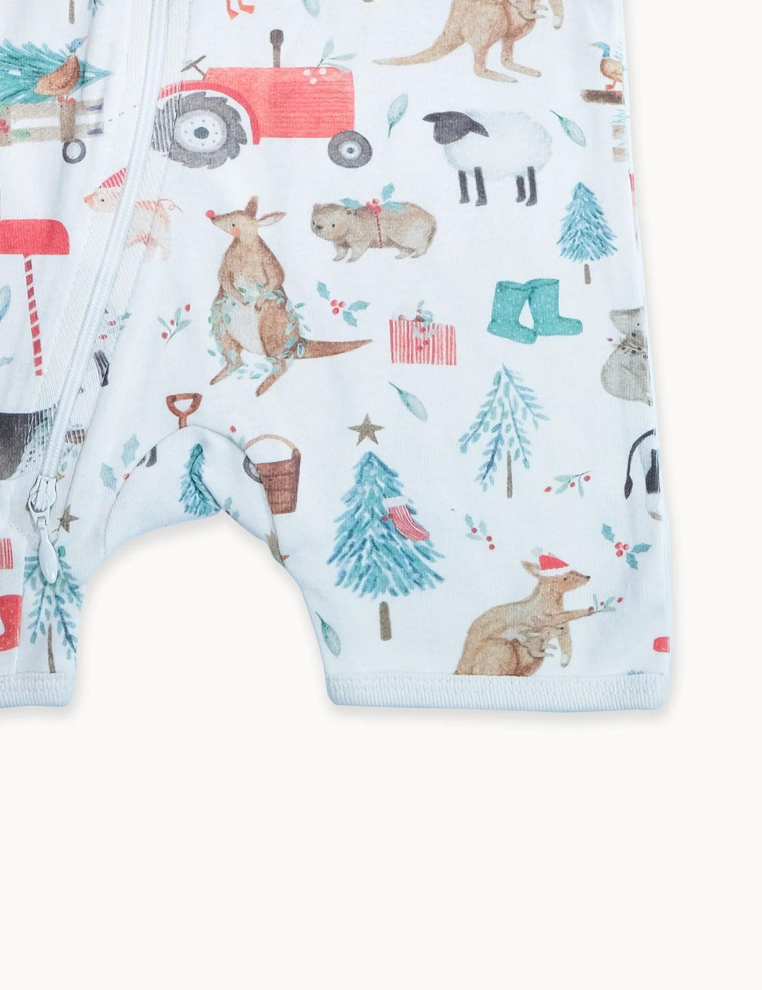 Organic cotton baby romper leg detail with farm animal and tractor holiday print