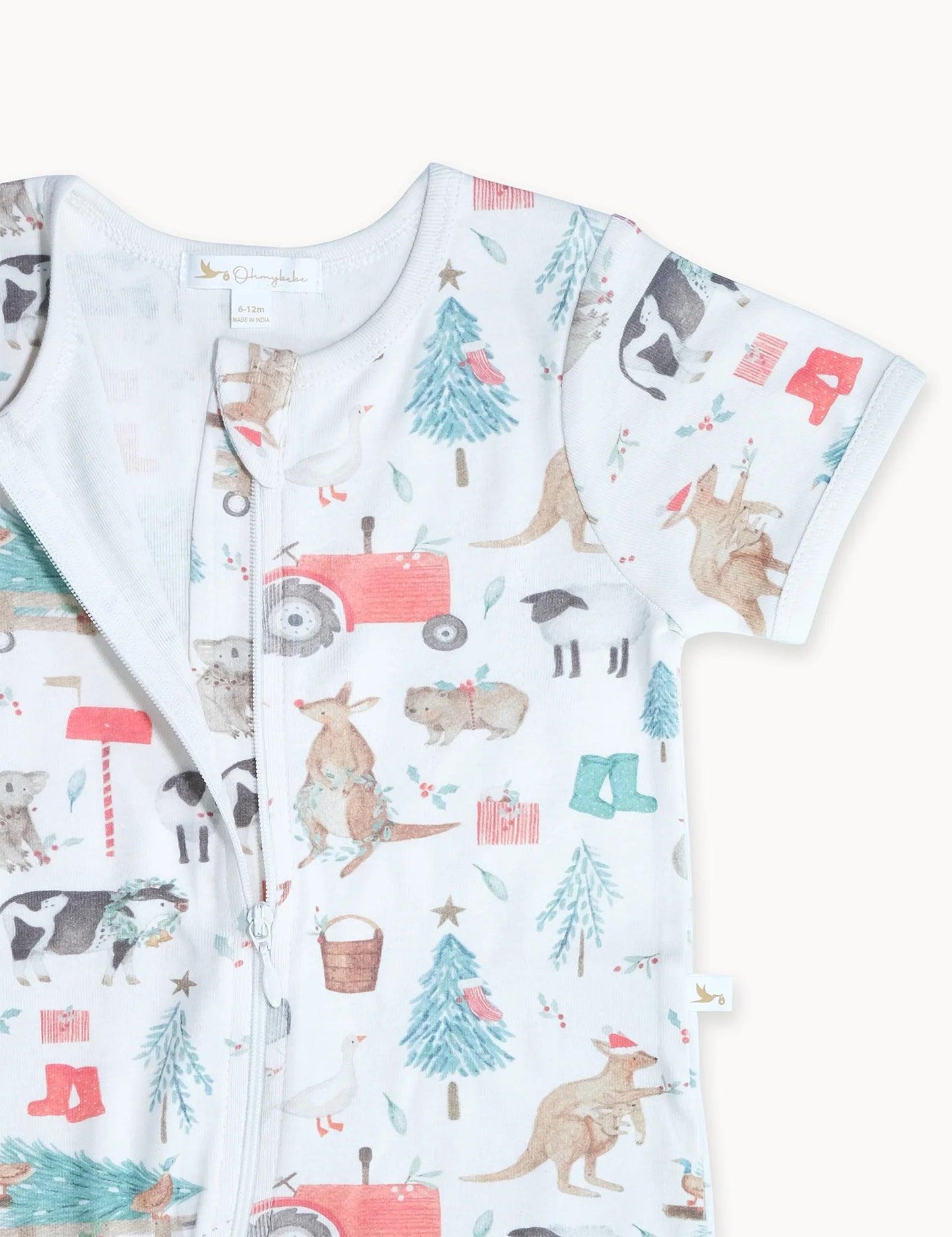 organic baby romper with zipper featuring farm and woodland animal prints in soft colors