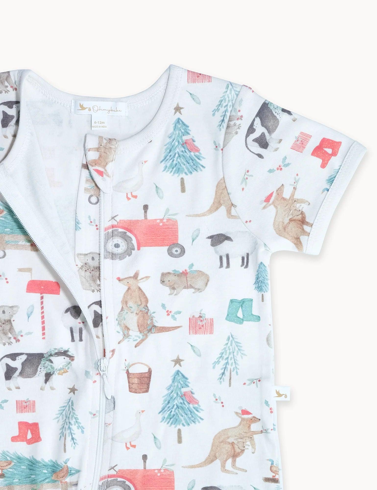 organic baby romper with zipper featuring farm and woodland animal prints in soft colors