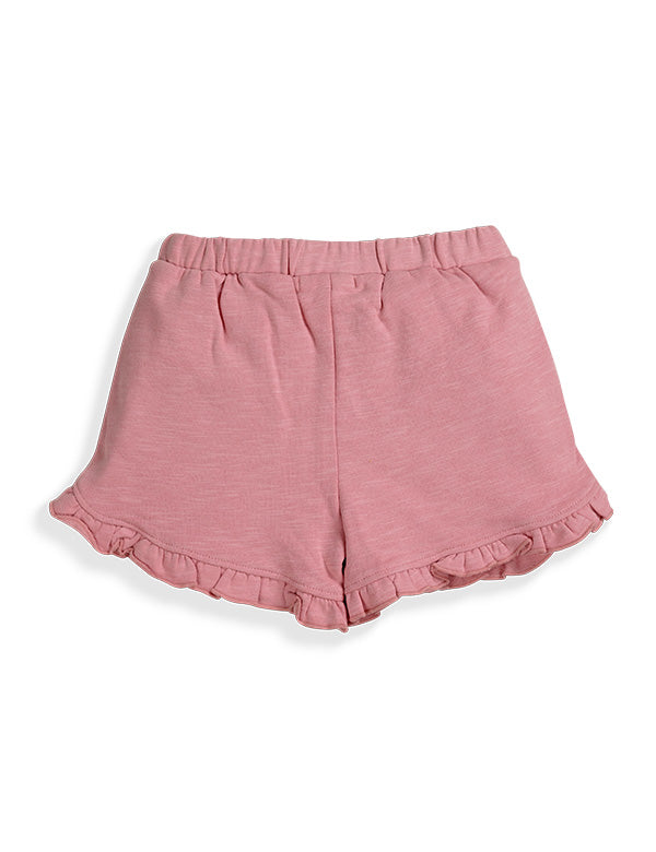 Pink toddler girl shorts with ruffled hem and elastic waistband on white background