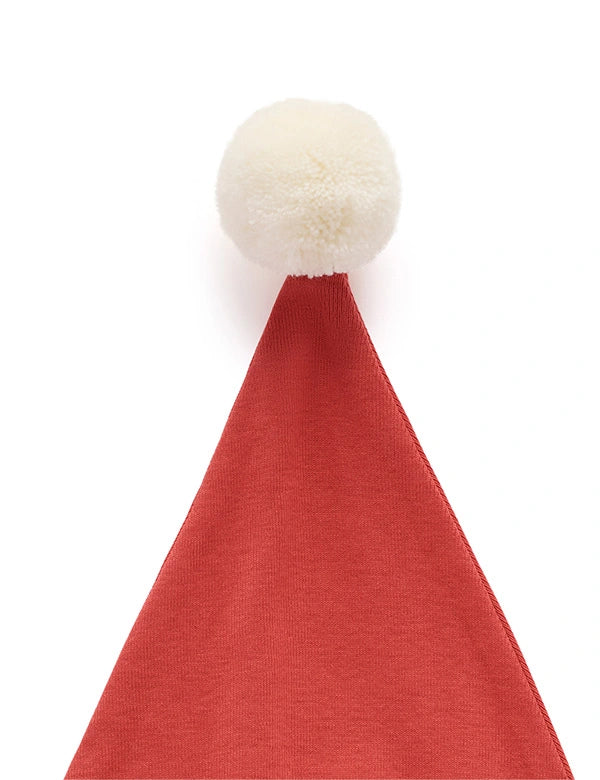 Red Santa hat with a white pom-pom on a white background