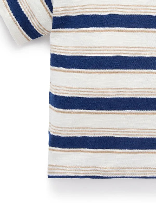 Close-up of a short sleeve shirt with navy blue and beige horizontal stripes on a white background