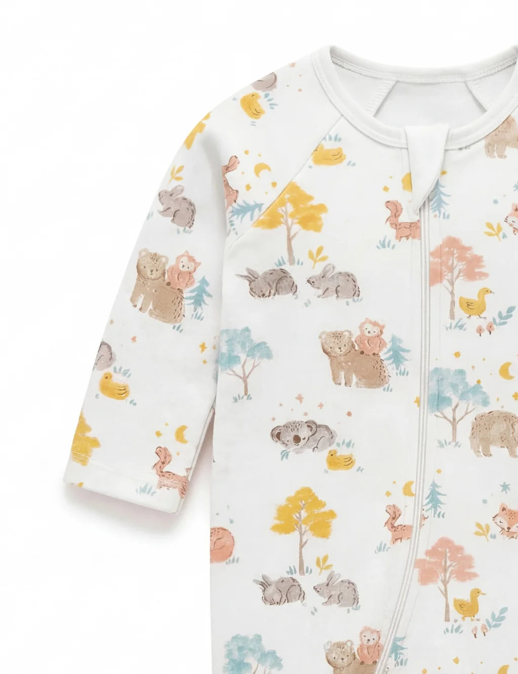 Sleeve detail of a white organic cotton baby romper showcasing the cute little nap pattern.