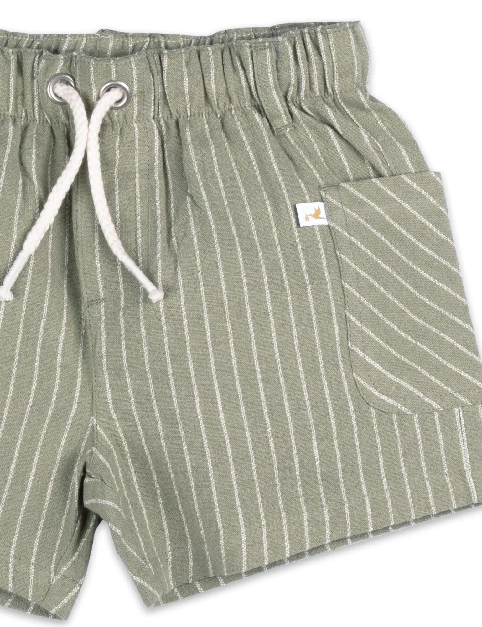 Green striped organic cotton baby shorts with elastic waistband and white drawstring