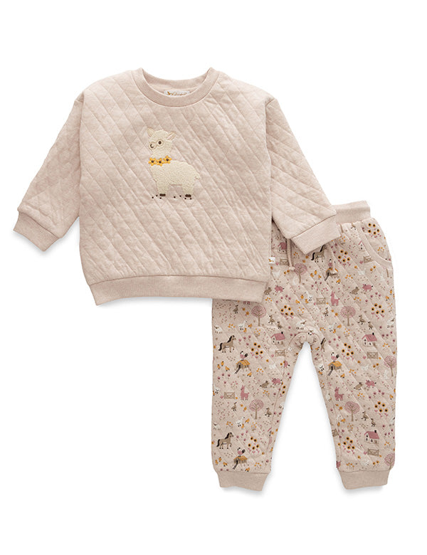 Beige quilted toddler sweatshirt with sheep graphic and printed jogger pants featuring animals and houses