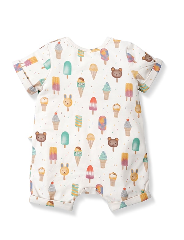 White baby romper with colorful ice cream cones, popsicles, and bear and bunny faces pattern